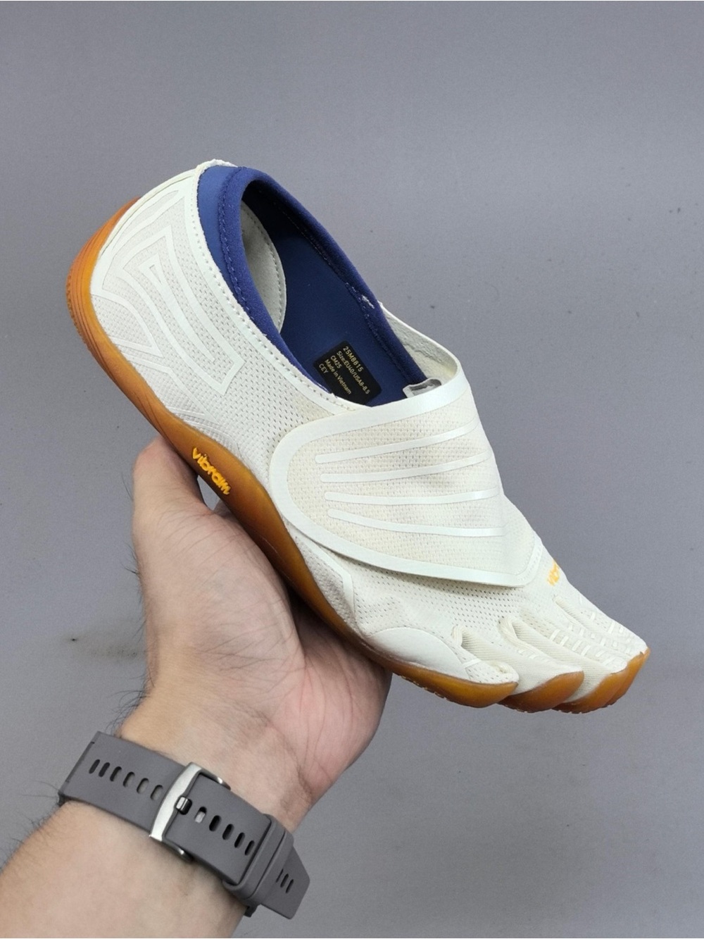 Vibram FiveFingers White Slip-On with Blue Collar and Gum Sole